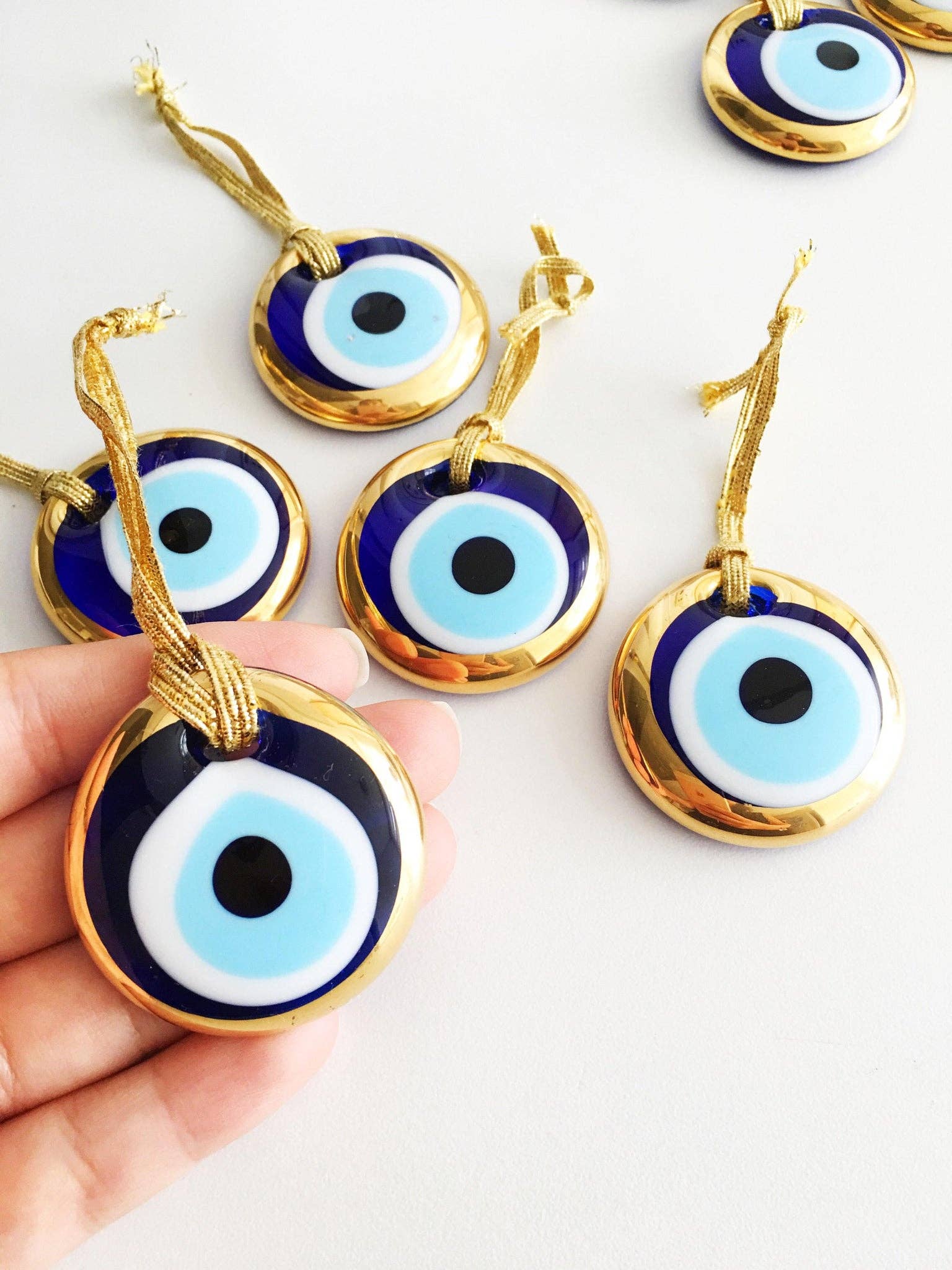 EVILEYE - Oeil en verre bord doré S
