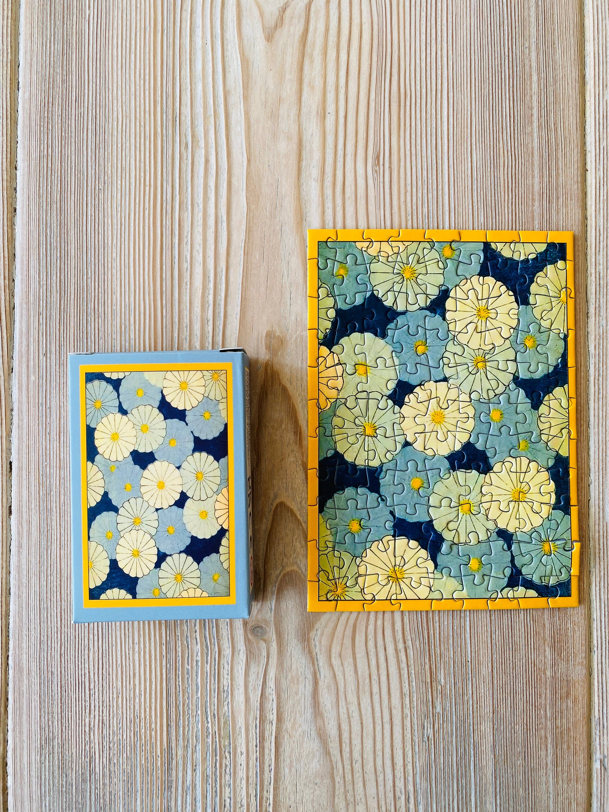 Mini-puzzle Parapluies à Fleurs assemblé – PENNY PUZZLE chez George Genève